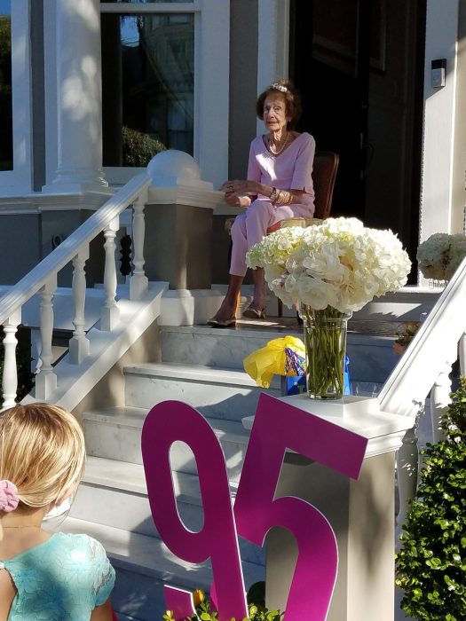 Molly McSweeney recently celebrated her 95th birthday. Neighbors gathered at a safe distance outside her home to celebrate.