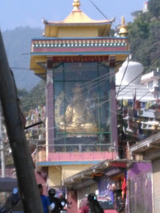 A parade bearing a statue of Guru Rinpoche, the 8th Century founder of Tibetan Buddhism. 