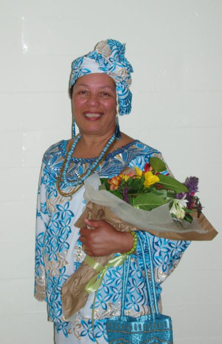 Watson in traditional Afro-Haitian dress.