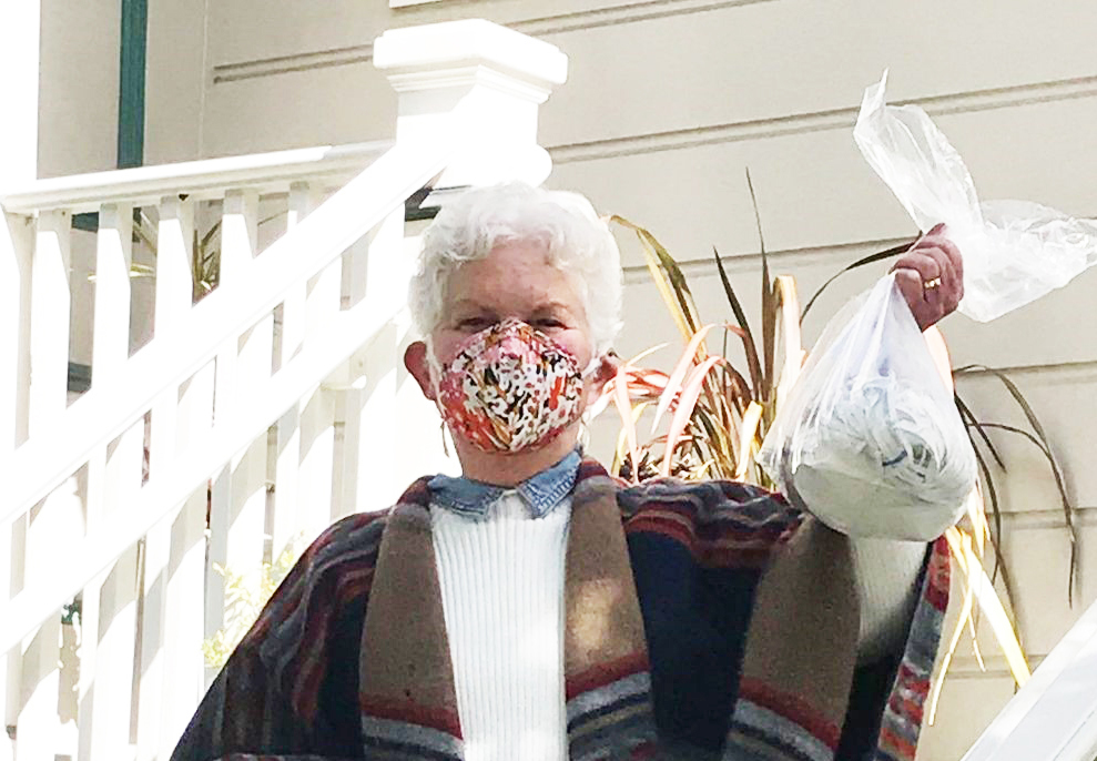 Retired tech executive carries the thread, joining friends to create a "mask-making" village at a time of crucial need