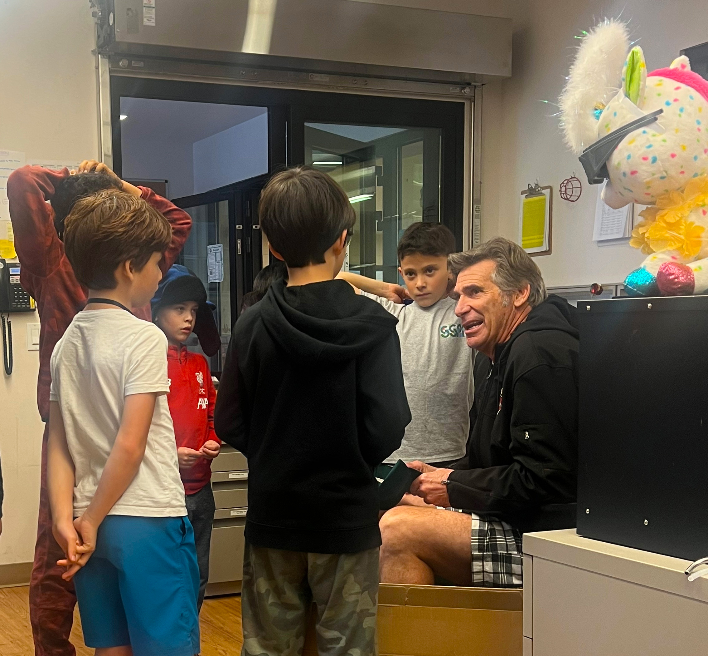 With Elvis as a mentor, Salesian Boys & Girls Club leader makes sure all the kids get a 'big hunk of love'