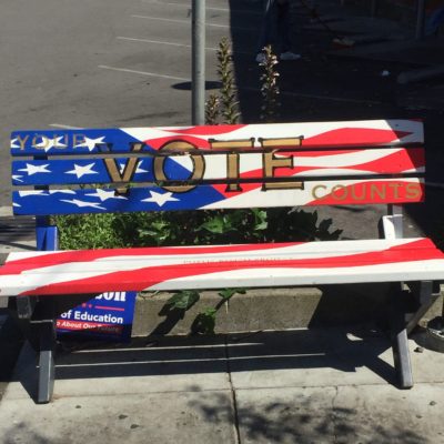 Bench painted with US flag and VOTE