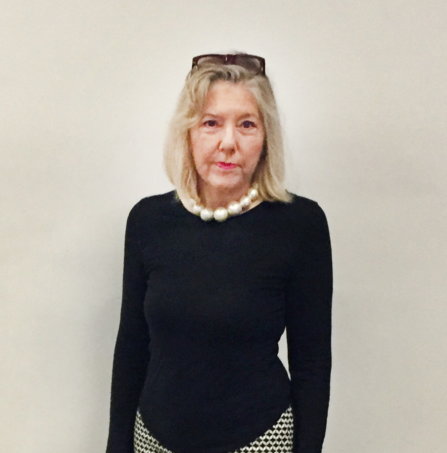 In dress, artist-sculptor-photographer-curator keeps it simple