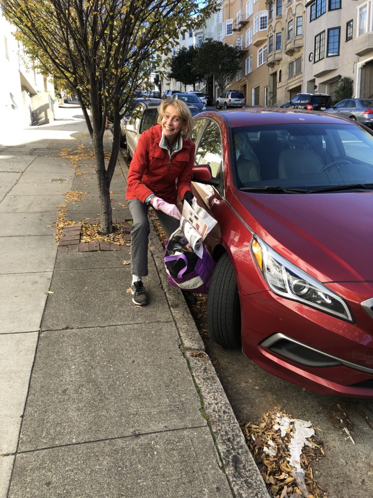 Melanie Grossman regularly picks up litter on Polk Street near her home.